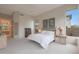 Comfortable main bedroom with carpet, ceiling fan and large window at 3120 E Squaw Peak Cir, Phoenix, AZ 85016