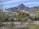 Picturesque view of mountains and homes in the community, as seen from the property at 3120 E Squaw Peak Cir, Phoenix, AZ 85016