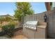 Built-in stainless steel outdoor grill perfect for backyard barbecues and entertaining guests at 3120 E Squaw Peak Cir, Phoenix, AZ 85016