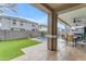 Charming backyard with a swimming pool, manicured lawn, and covered patio space at 3555 E Gary Way, Gilbert, AZ 85234