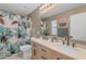 Bright bathroom with a double sink vanity and a flower-themed shower curtain at 3555 E Gary Way, Gilbert, AZ 85234