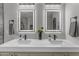 Modern bathroom featuring a double sink vanity, quartz countertop, and modern fixtures at 3555 E Gary Way, Gilbert, AZ 85234