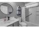 Bathroom with shower-tub combo and stacked towels at 3555 E Gary Way, Gilbert, AZ 85234