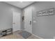 Welcoming home entryway featuring tile flooring, a storage bench, and a 'Home Sweet Home' sign at 3555 E Gary Way, Gilbert, AZ 85234