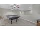 Bright game room featuring a sleek ping pong table, plush carpet, and neutral paint at 3555 E Gary Way, Gilbert, AZ 85234