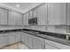 Updated kitchen featuring stainless steel appliances, stylish backsplash, and granite countertops at 3555 E Gary Way, Gilbert, AZ 85234