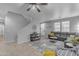 Living room features tile flooring, comfortable seating, and abundant natural light at 3555 E Gary Way, Gilbert, AZ 85234