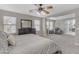 Spacious main bedroom features a dresser with a mirror and bright natural light at 3555 E Gary Way, Gilbert, AZ 85234