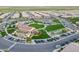 Aerial view of community featuring landscaping, common areas, tennis courts, and swimming pool at 37036 N Stoneware Dr, Queen Creek, AZ 85140
