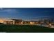Expansive exterior view features manicured grounds, multiple buildings, and scenic lighting at 37036 N Stoneware Dr, Queen Creek, AZ 85140