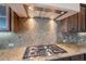 Close-up of the kitchen cooktop with stainless steel appliances and granite countertops at 37036 N Stoneware Dr, Queen Creek, AZ 85140