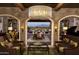 Elegant living room featuring comfortable seating, stylish decor, and an open floor plan at 37036 N Stoneware Dr, Queen Creek, AZ 85140