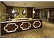 Aesthetic club features a stylish reception area with elegant decor and lighting at 37036 N Stoneware Dr, Queen Creek, AZ 85140