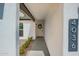 Inviting entrance with cacti, neutral gravel, and modern house number display at 4036 E Captain Dreyfus Ave, Phoenix, AZ 85032