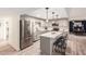 Modern kitchen featuring quartz countertops, stainless steel appliances, and sleek finishes at 4036 E Captain Dreyfus Ave, Phoenix, AZ 85032