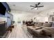 Spacious living room with modern flooring, and open floor plan at 4036 E Captain Dreyfus Ave, Phoenix, AZ 85032