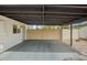 Spacious covered patio with a dark wood ceiling at 4036 E Captain Dreyfus Ave, Phoenix, AZ 85032