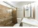 Bathroom featuring tiled walk-in shower, modern vanity, and updated fixtures, providing a spa-like experience at 4207 W Poinsettia Dr, Phoenix, AZ 85029