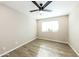 Bedroom featuring sleek flooring, neutral color palette, ceiling fan, recessed lighting, and window for light at 4207 W Poinsettia Dr, Phoenix, AZ 85029