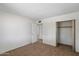 Bedroom with closet, neutral colors, and plenty of natural light at 4257 E Marino Dr, Phoenix, AZ 85032