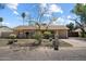 Charming single-story home with a well-maintained front yard and inviting curb appeal at 4257 E Marino Dr, Phoenix, AZ 85032