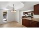 Eat-in kitchen with granite countertops and stainless steel appliances; a chef's dream! at 4257 E Marino Dr, Phoenix, AZ 85032