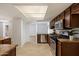 Open kitchen with stainless steel appliances, wood cabinets, and a bright, airy atmosphere at 4257 E Marino Dr, Phoenix, AZ 85032