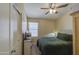 This bedroom features a ceiling fan, natural light, and a cozy atmosphere for restful nights at 4369 E Coal St, San Tan Valley, AZ 85143