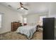 Bright bedroom boasting a ceiling fan and ample space for furnishings at 4369 E Coal St, San Tan Valley, AZ 85143