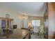 Well-lit dining room features a large table with seating and ample storage at 4369 E Coal St, San Tan Valley, AZ 85143