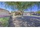 Charming single-story home featuring well-manicured landscaping and a covered front porch at 4369 E Coal St, San Tan Valley, AZ 85143