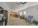 Spacious living area seamlessly flows into an open-concept kitchen and dining space at 4369 E Coal St, San Tan Valley, AZ 85143