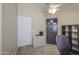 Functional home office features a ceiling fan, desk, and security safe for secure productivity at 4369 E Coal St, San Tan Valley, AZ 85143