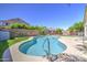 Private in-ground pool with artificial turf and a flamingo creates a serene and fun outdoor oasis at 4369 E Coal St, San Tan Valley, AZ 85143