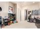 Spacious bedroom filled with guitar and toy collectibles and large closet at 4419 W Lodge Dr, Laveen, AZ 85339