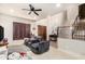 Cozy living room featuring plush sofas, neutral walls, and carpeted floors at 4419 W Lodge Dr, Laveen, AZ 85339