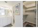 Bright bathroom features vanity with a neutral countertop and ample storage at 4554 E Paradise Village N Pkwy # 249, Phoenix, AZ 85032
