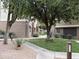 Well-maintained courtyard with desert landscaping and walkways between buildings at 4554 E Paradise Village N Pkwy # 249, Phoenix, AZ 85032