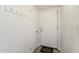 Bright entryway with coat hooks and a welcome mat offers a clean and inviting first impression of the home at 4554 E Paradise Village N Pkwy # 249, Phoenix, AZ 85032