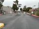Entrance gate to the community with security features, including signage and automated gate at 4554 E Paradise Village N Pkwy # 249, Phoenix, AZ 85032