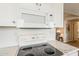 Bright kitchen features a white microwave and range/oven, with light countertop at 4554 E Paradise Village N Pkwy # 249, Phoenix, AZ 85032
