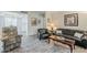 Comfortable living room with modern flooring and cozy furnishings creates an inviting space for relaxation at 4554 E Paradise Village N Pkwy # 249, Phoenix, AZ 85032