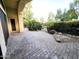 Paver patio in backyard with desert landscaping and views of a water feature at 4643 N Clear Creek Dr, Litchfield Park, AZ 85340