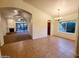 Open-concept dining area with tile flooring and views of the living room at 4643 N Clear Creek Dr, Litchfield Park, AZ 85340