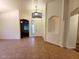 Open entryway with tan tile flooring, arched entryways, and a decorative arched niche at 4643 N Clear Creek Dr, Litchfield Park, AZ 85340