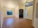 Open floor plan with a tile foyer that leads into the dining and living area at 4643 N Clear Creek Dr, Litchfield Park, AZ 85340