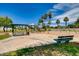 Community playground with swings, play structure, picnic table, and benches at 4643 N Clear Creek Dr, Litchfield Park, AZ 85340