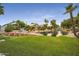 Picturesque water feature surrounded by lush greenery and well-manicured landscaping at 4643 N Clear Creek Dr, Litchfield Park, AZ 85340