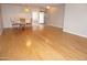 Bright dining area with hardwood floors and a table setting at 4773 E Hopi St, Phoenix, AZ 85044