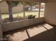 A covered and screened lanai with views of backyard at 4773 E Hopi St, Phoenix, AZ 85044